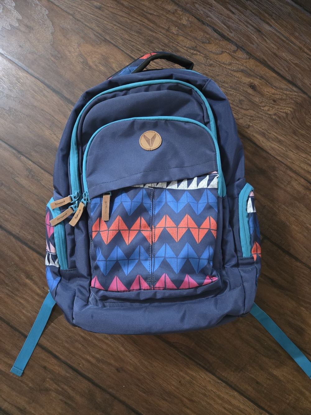 Women's Navy Backpack with Multicolor Geometric Print and Teal Trim